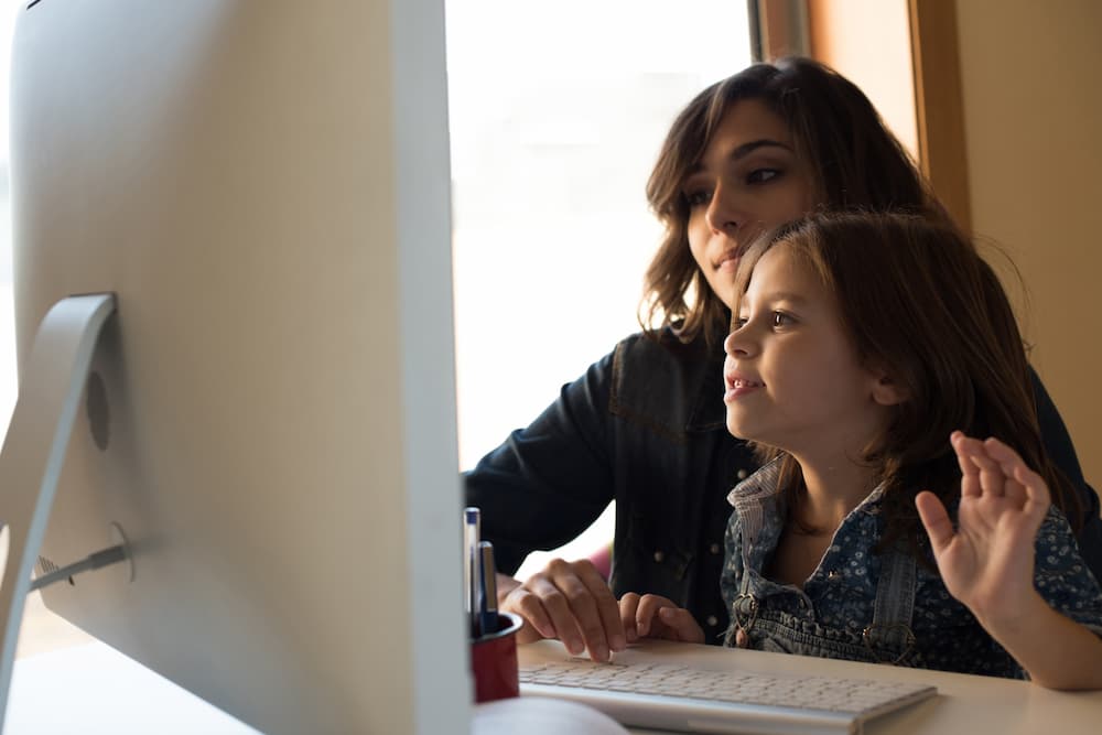 Mom and Daughter using computer